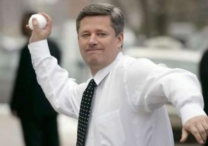 Stephen-Harper hurls a ball