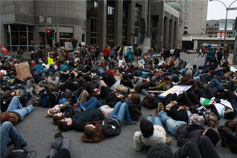 Protesters lying down in the street