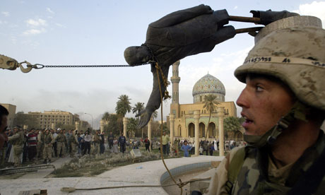 A-statue-of-Saddam-Hussein-is-pulled-down-in-Baghdad-on-9-April-2003.-Photograph-Jerome-Delay-AP