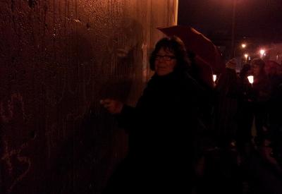 Libby writes on sex worker support wall
