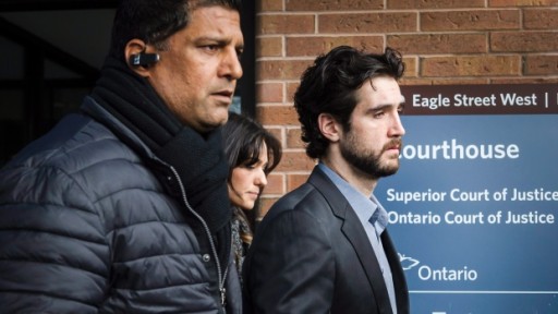Marco Muzzo (right) leaves the courthouse (image: Canadian Press)